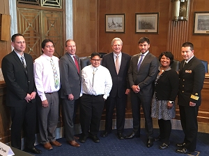 RADM Chris Buchanan with witnesses and Members of Congress after the U.S. Senate Committee on Indian Affairs hearing.